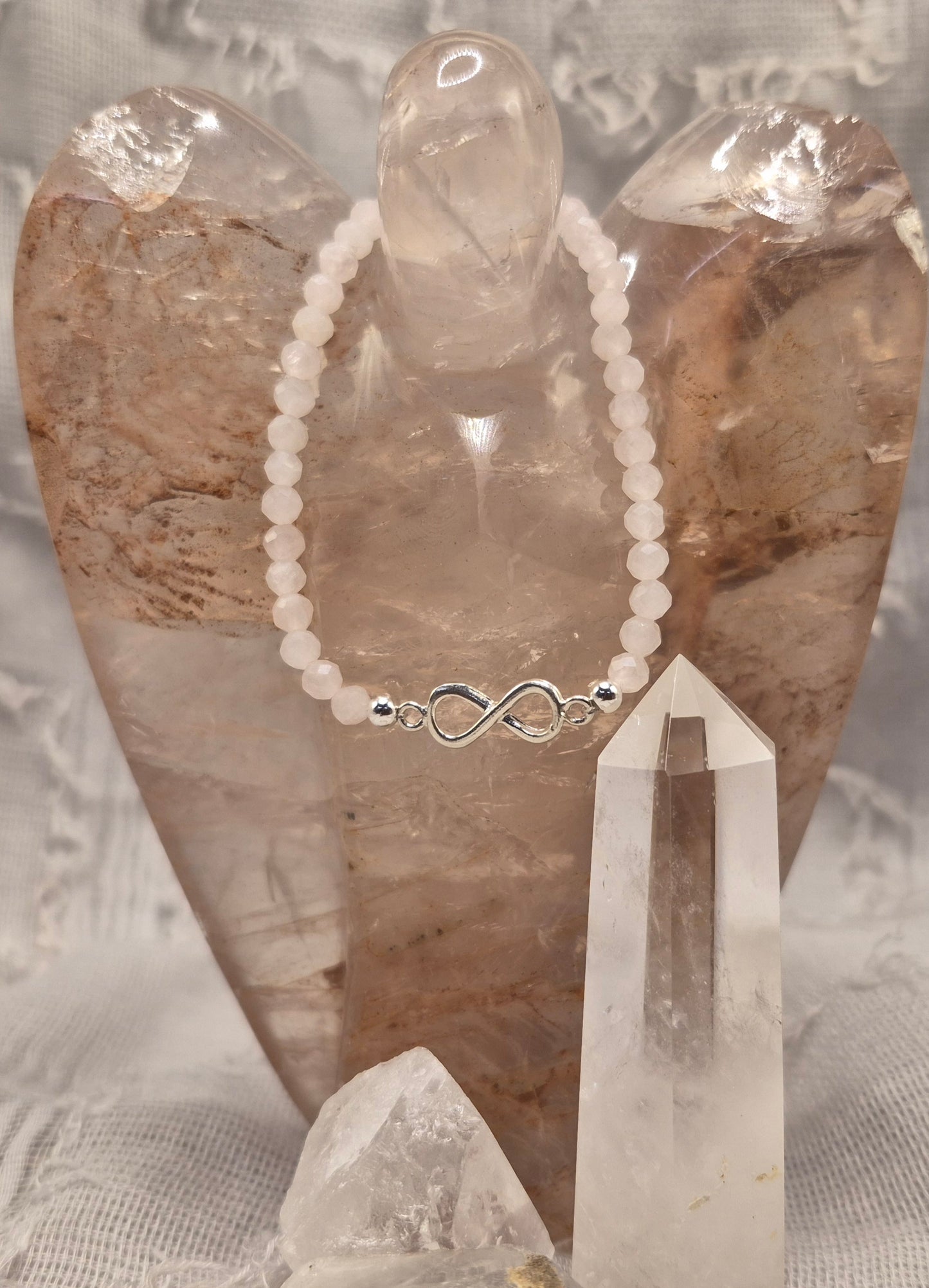 Armband Rosenquarz, Endlosschleife in Silber - Liebe, Harmonie und Herzensenergie