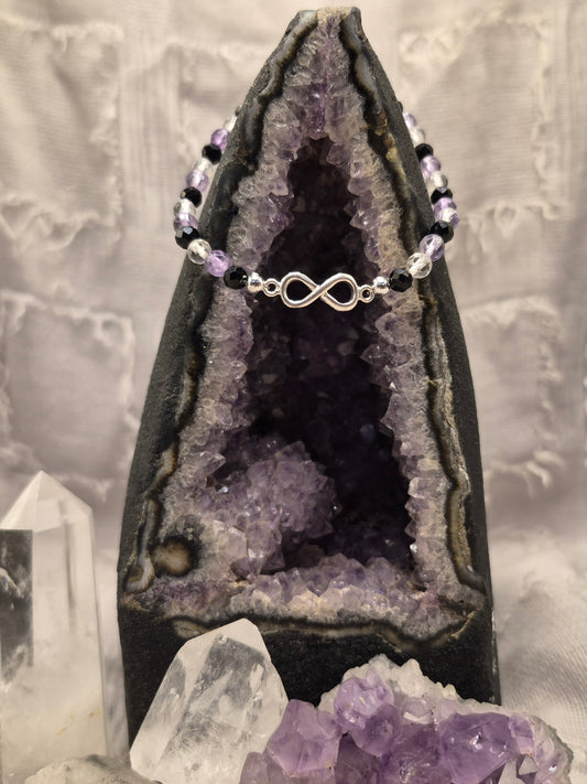 Armband aus Bergkristall, Amethyst & schwarzem Turmalin, Endlosschleife Silber - Schutz, Klarheit und innere Ruhe